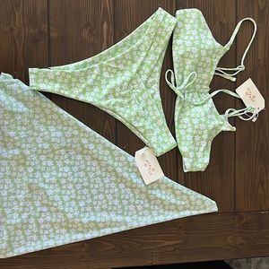 Aurelle Maui green sporty tie top , Maui green v cut bottoms , beach day skirt